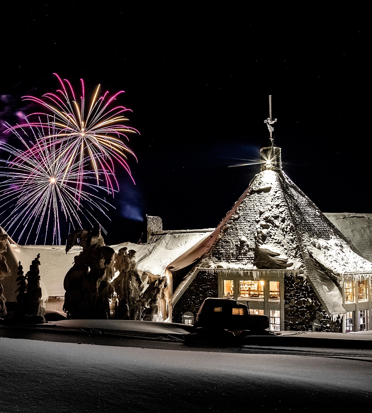 FIREWORKS EXPLODING OVER TIMBERLINE LODGE ON NYE