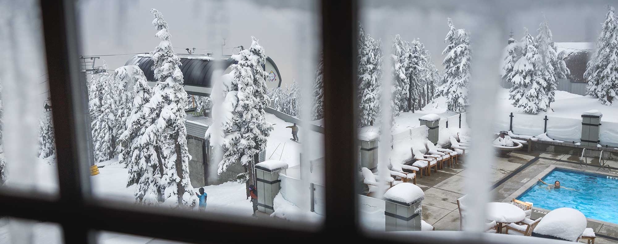 TIMBERLINE SWIMMING POOL NEXT TO THE PUCCI LIFT DRENCHED IN SNOW