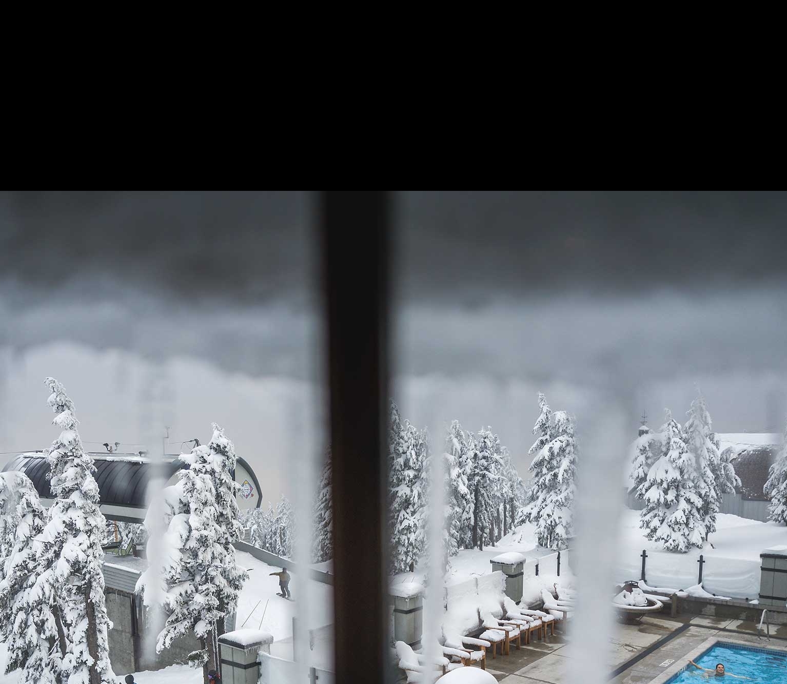 TIMBERLINE SWIMMING POOL NEXT TO THE PUCCI LIFT DRENCHED IN SNOW