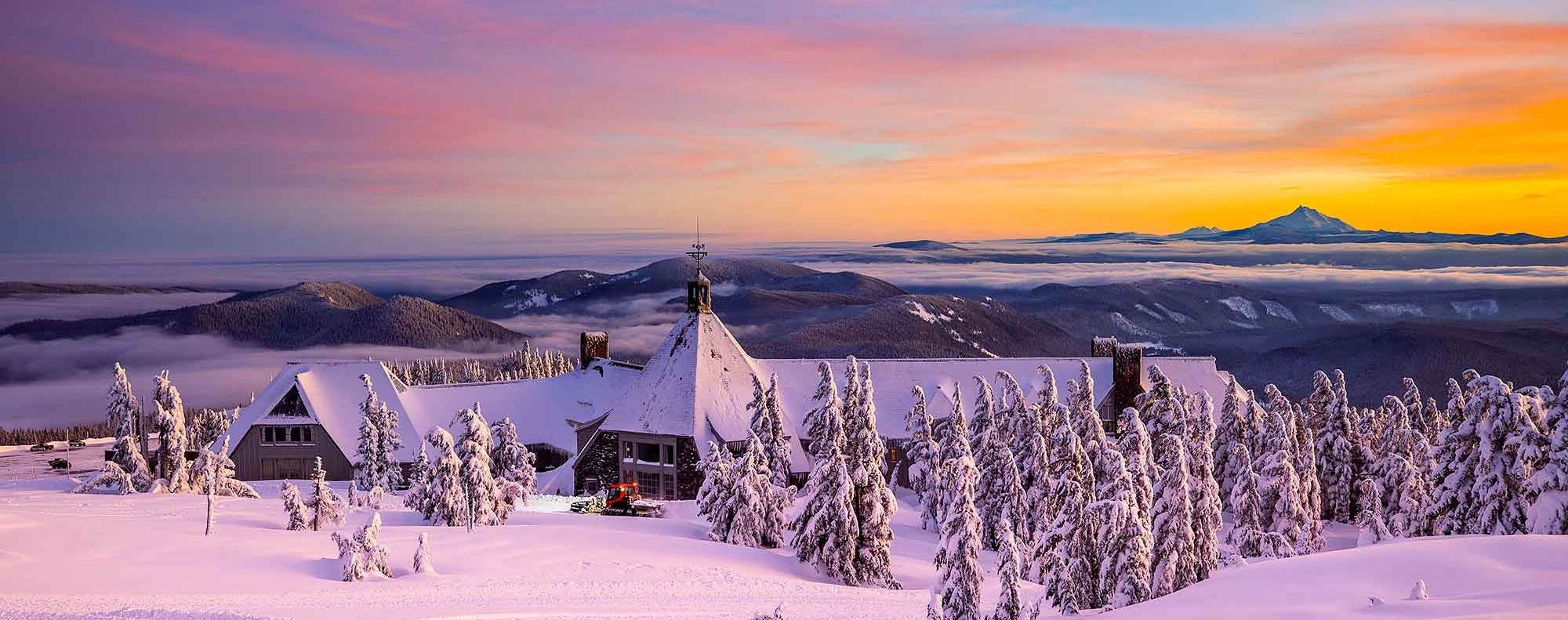 VIEW OF TIMBERLINE LODGE FROM THE REAR AT SUNSET 