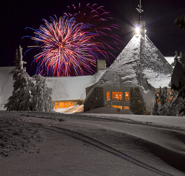 Fireworks going off over Timberline Lodge on New Year's Eve