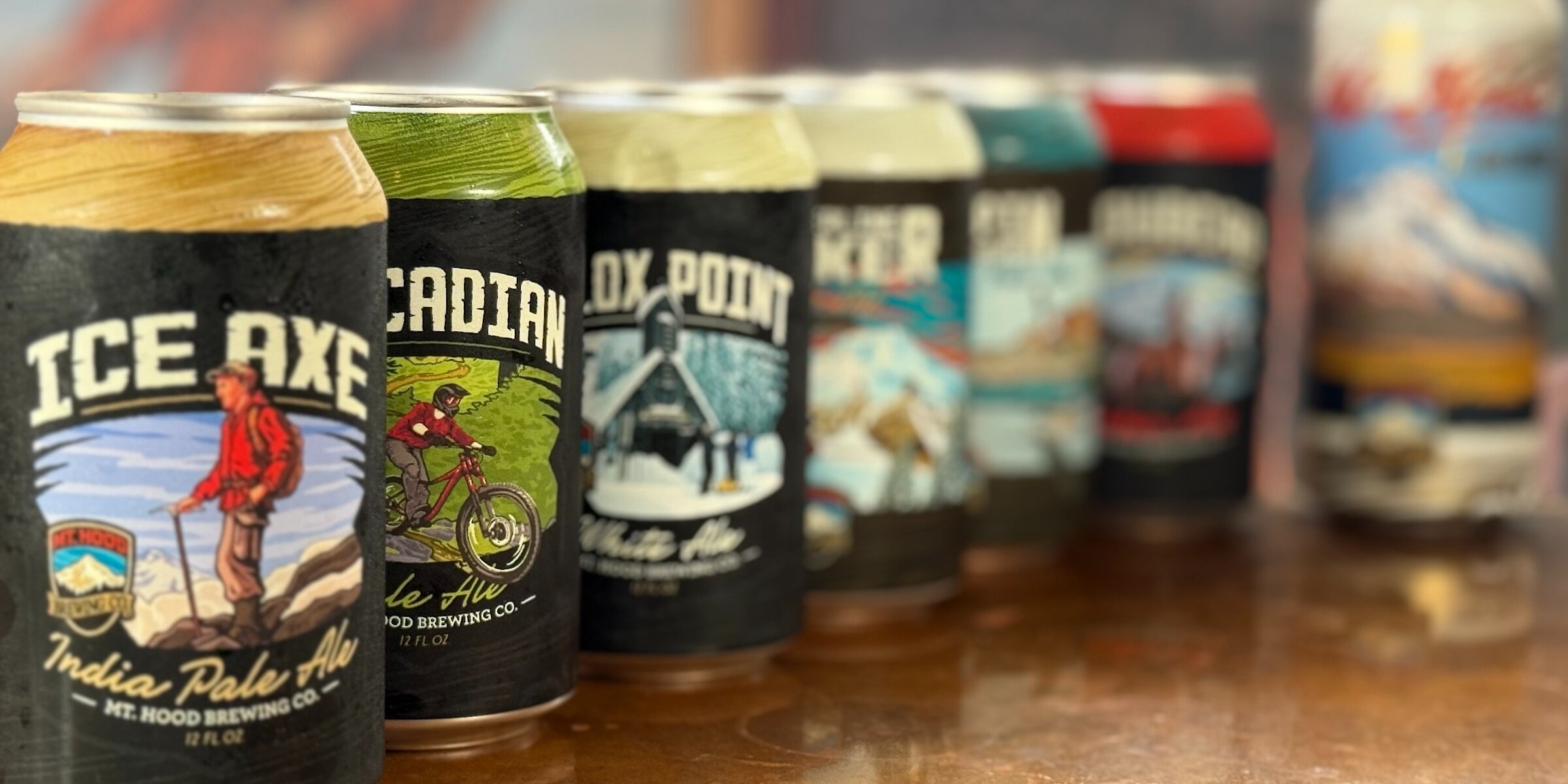 Lineup of Mt. Hood Brewing Co. canned beers