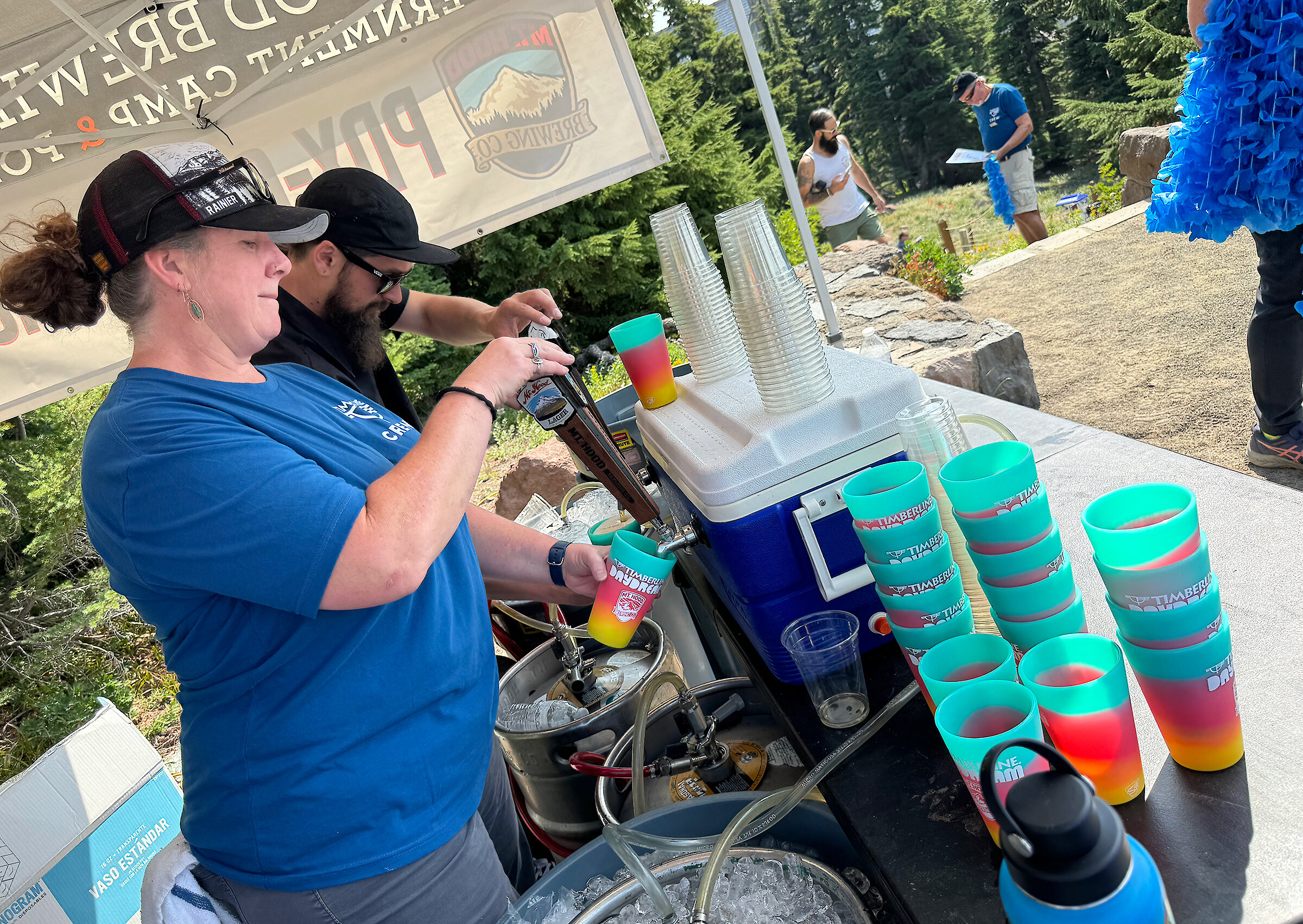 Timberline staff pouring beers at Timberline Daydream