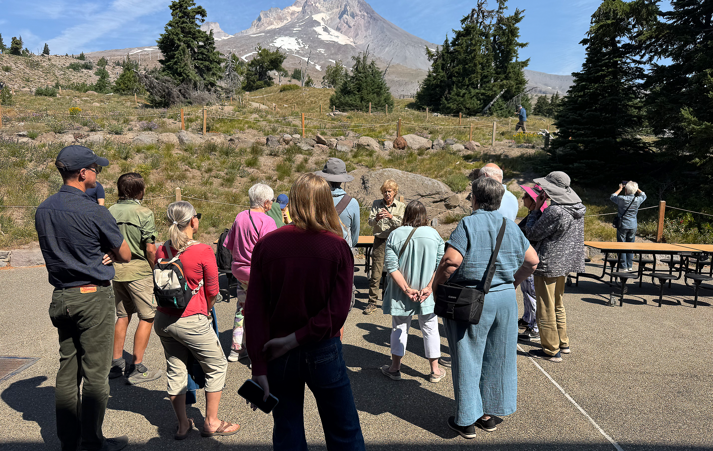 US Forest Tour on the back patio at Timberline Lodge with Mt. Hood in the background