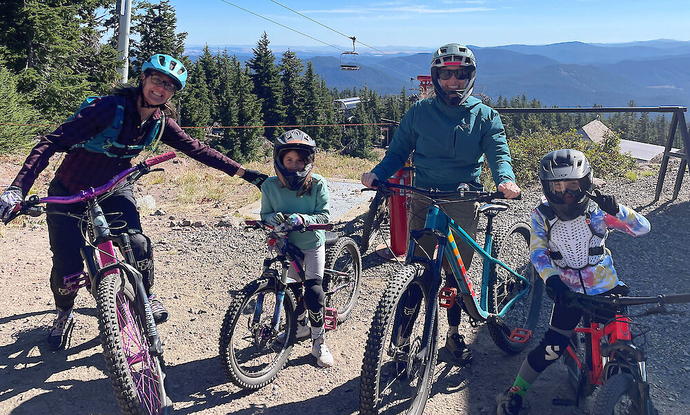 Two moms and their kids in the Timberline Bike Park