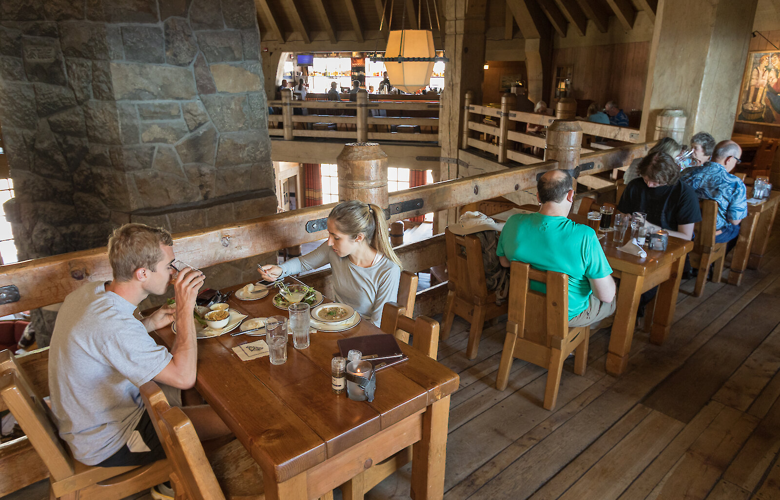 People enjoying lunch on the mezzanine at Timberline Ram's Head Bar