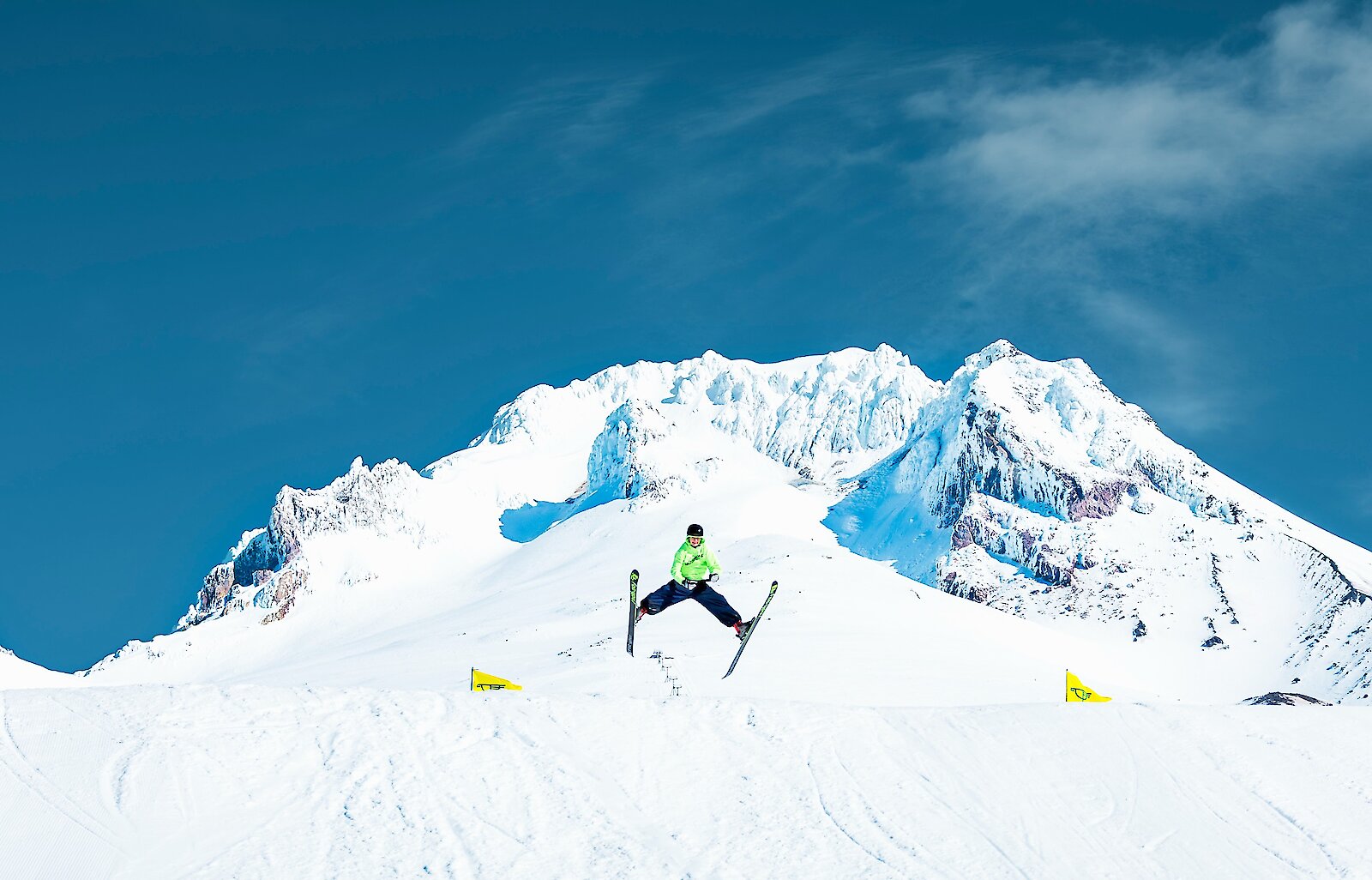 Skier spread-eagle jumping on Mt. Hood at Timberline