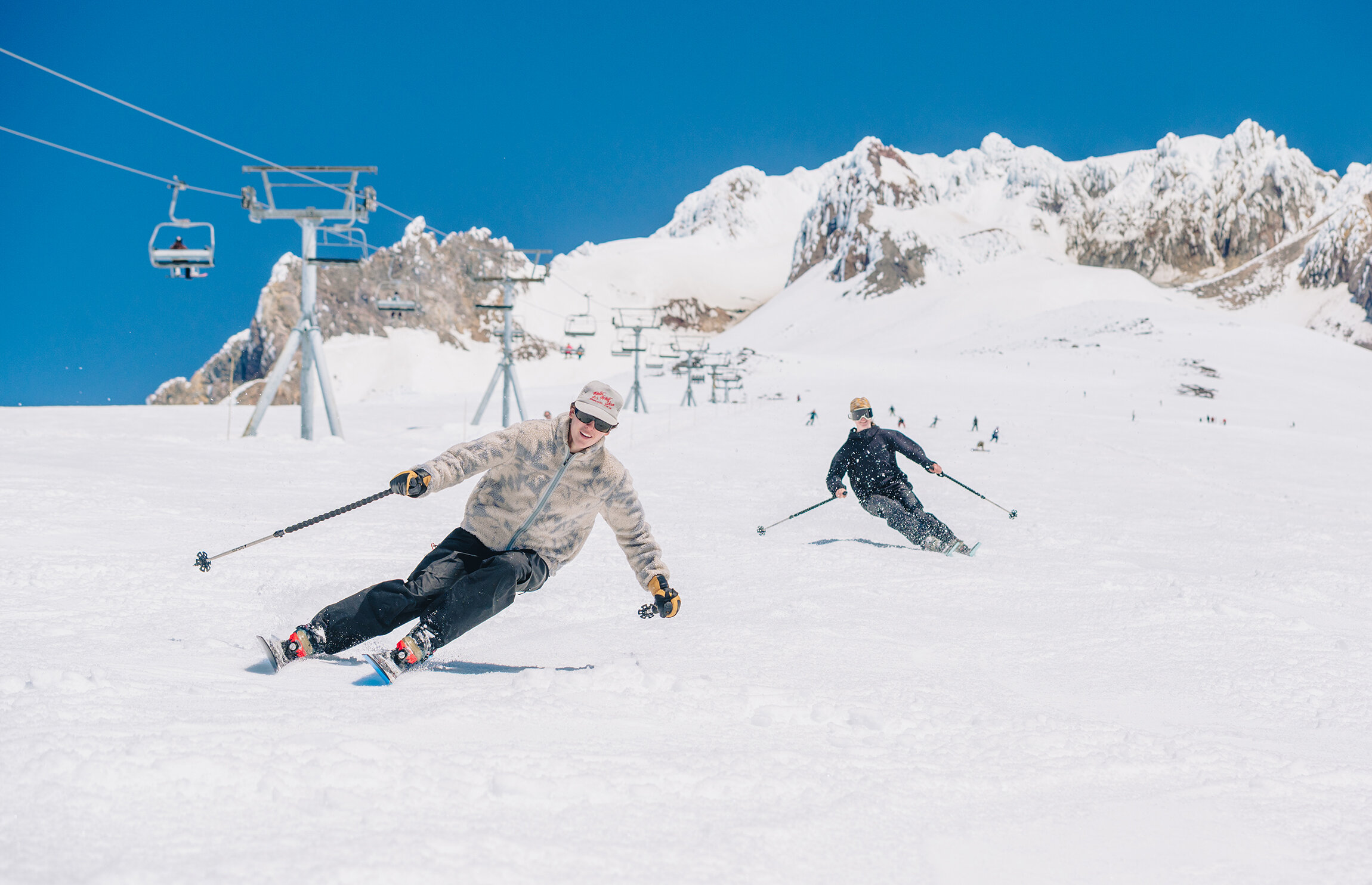 Two skiers on Timberline's Palmer Snowfield
