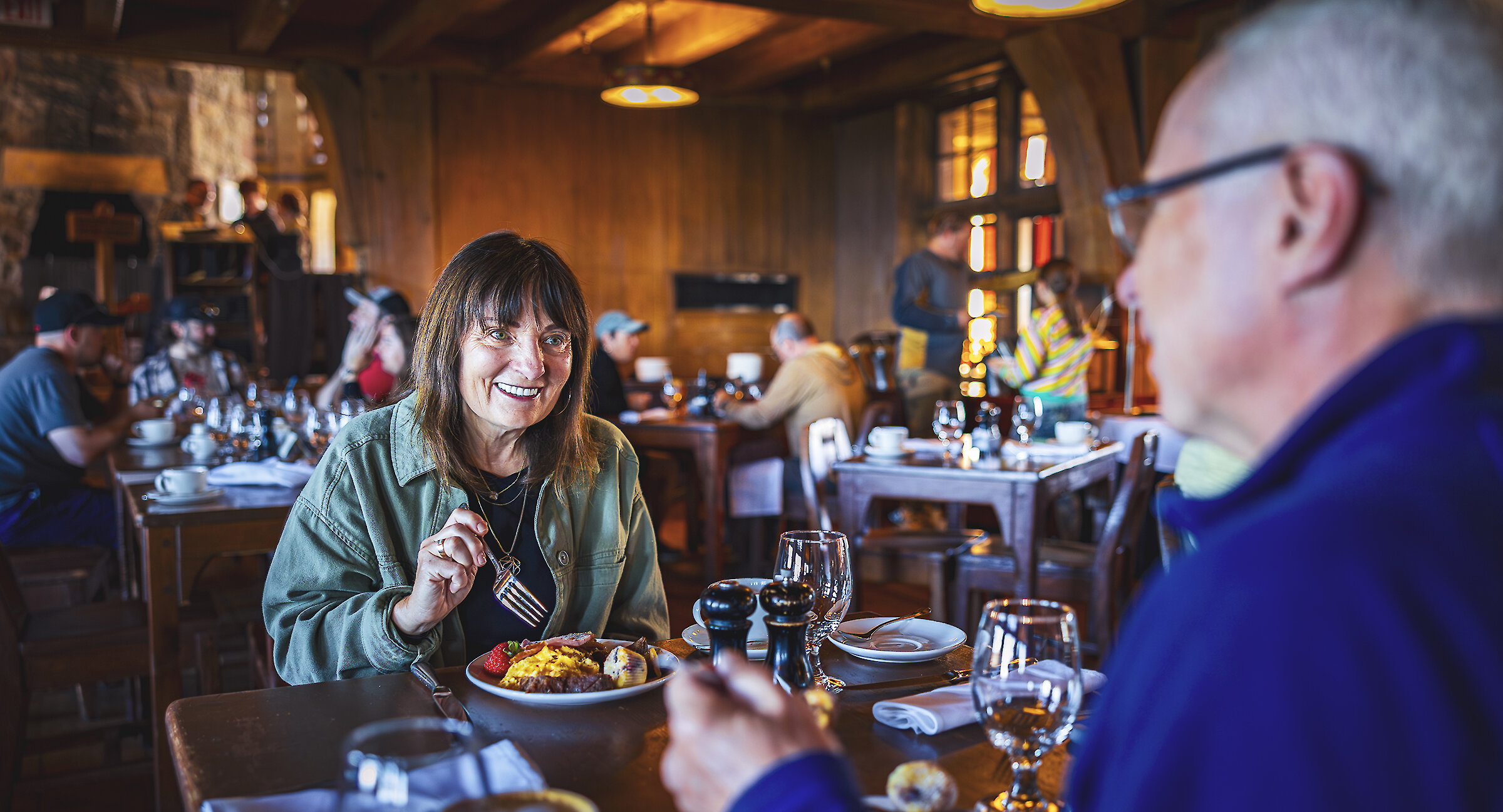 Couple enjoying the breakfast buffet at Timberline's Cascade Dining Room.