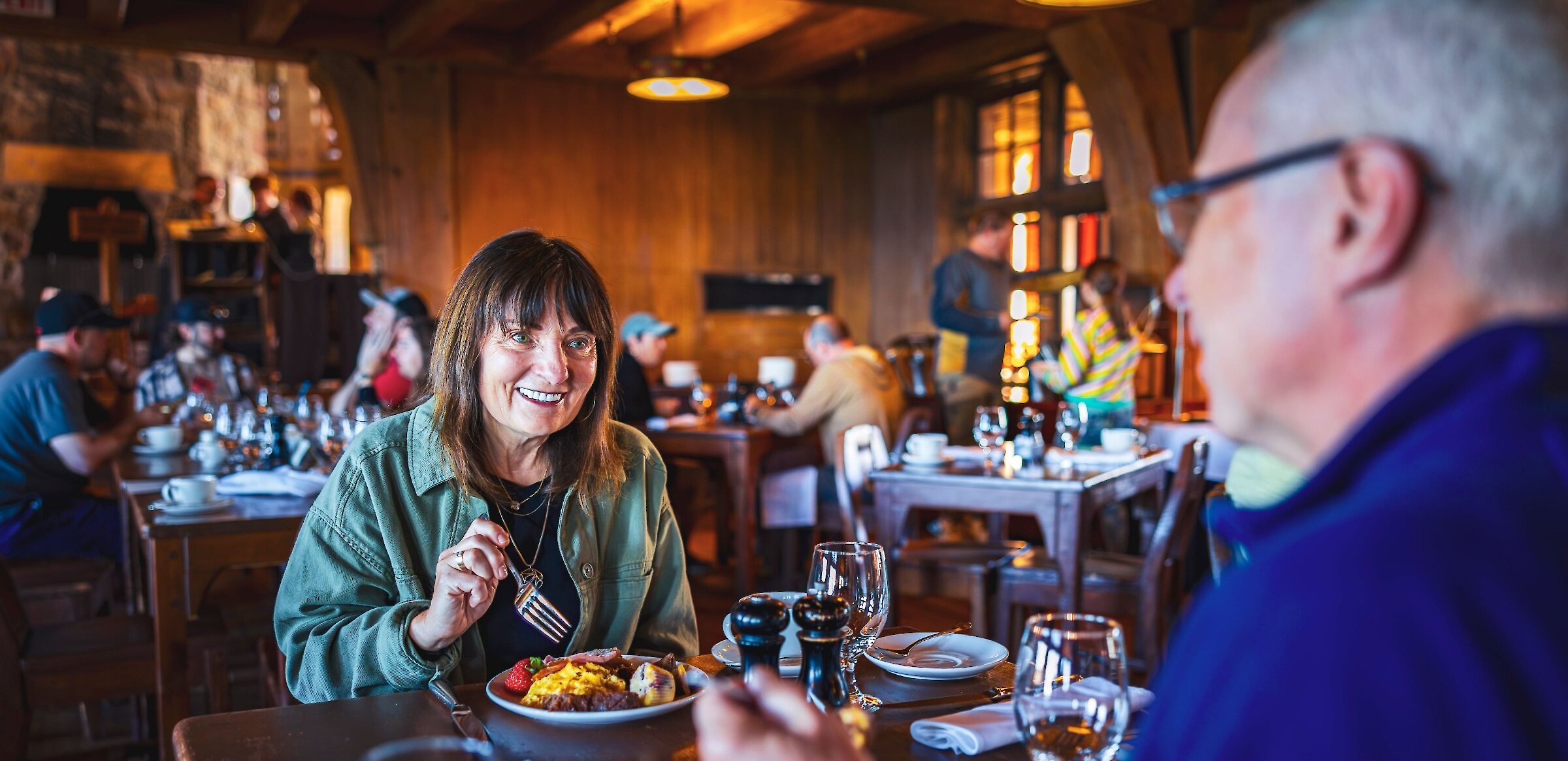 Couple dining at the Cascade Dining Room breakfast buffet at Timberline