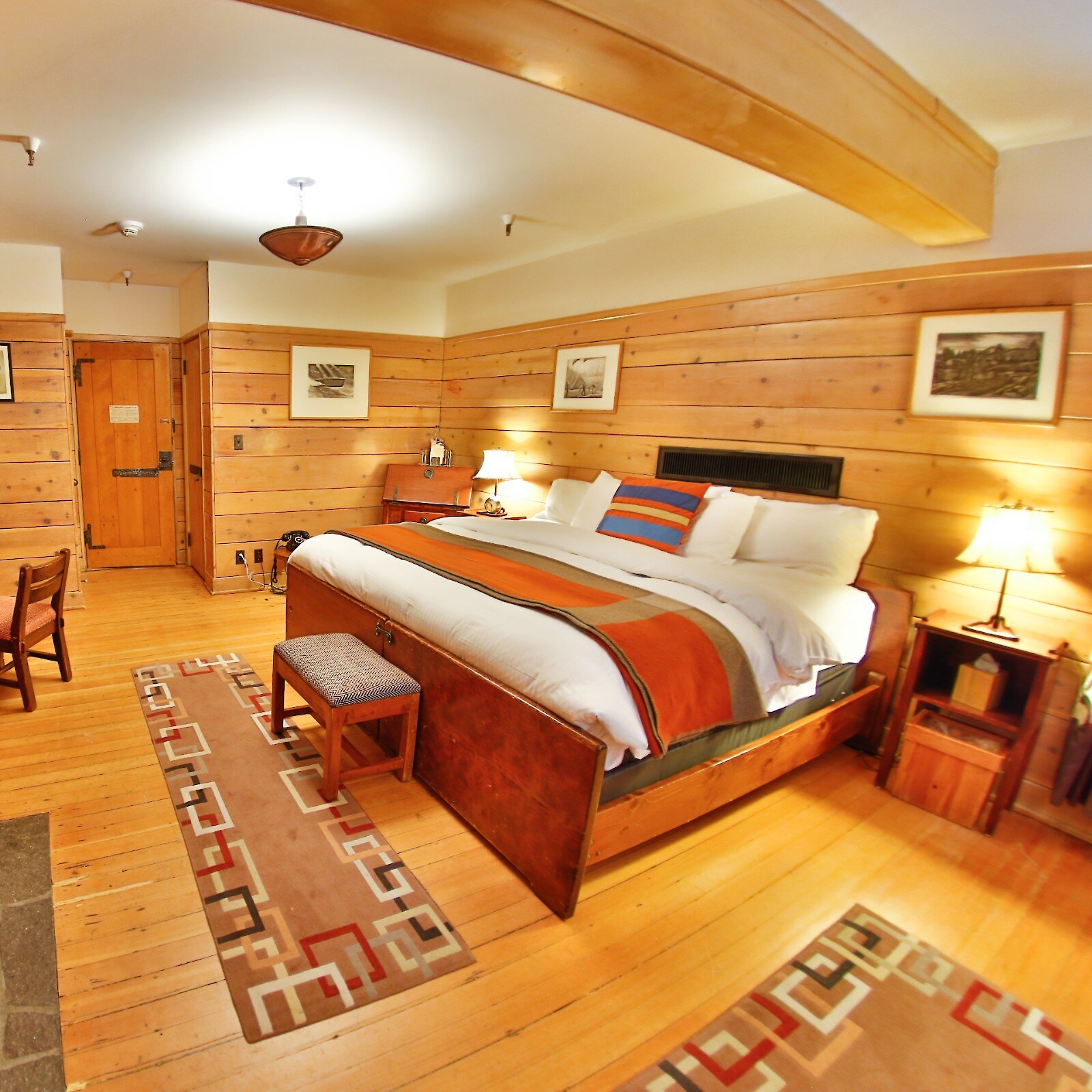 Accessible Timberline hotel room pictured with a king bed and rustic furnishings