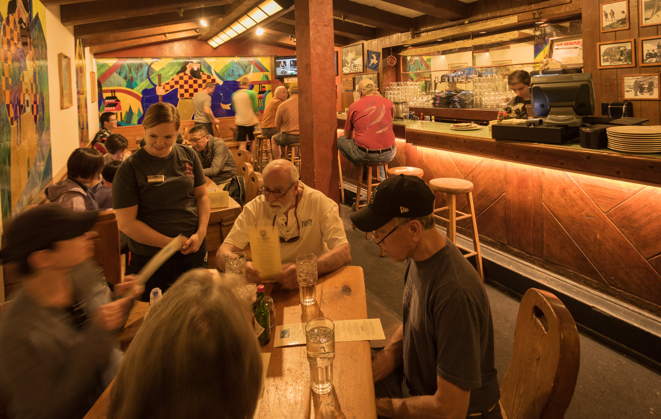 Folks dining in the Blue Ox Bar at Timberline Lodge