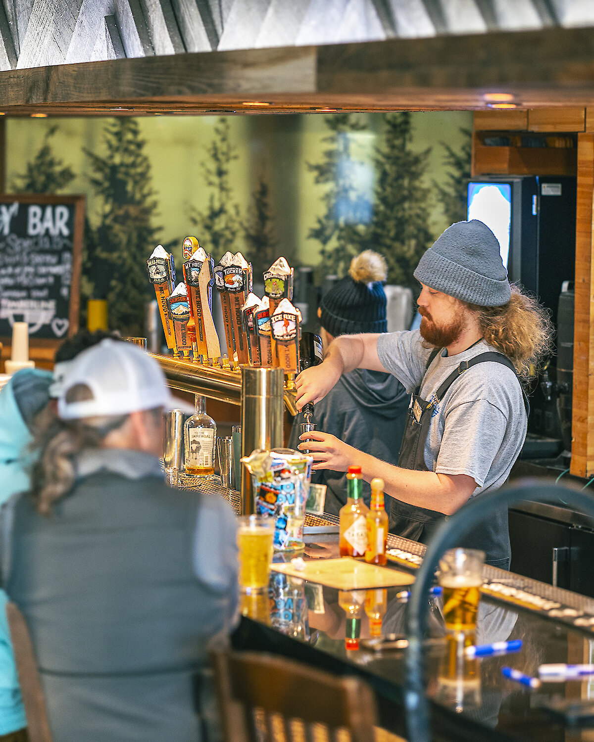 Skiers and snowboarders enjoying refreshments at the Y'Bar at Timberline