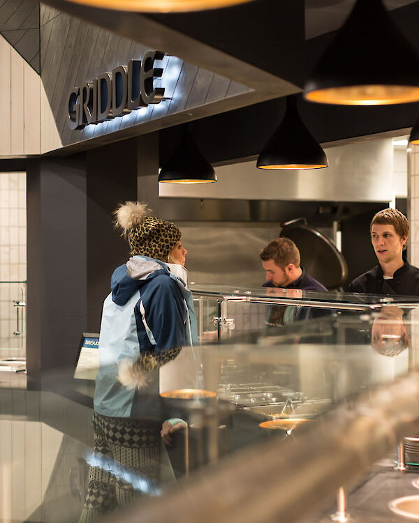 Guest placing an order at Timberline's Wy'East Cafe