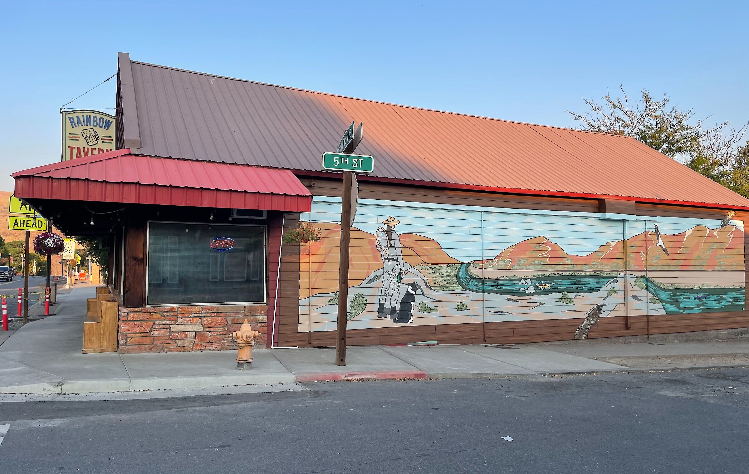 Flyfishing mural painted on the side of Mt. Hood Brewing Co Raingbow Tavern