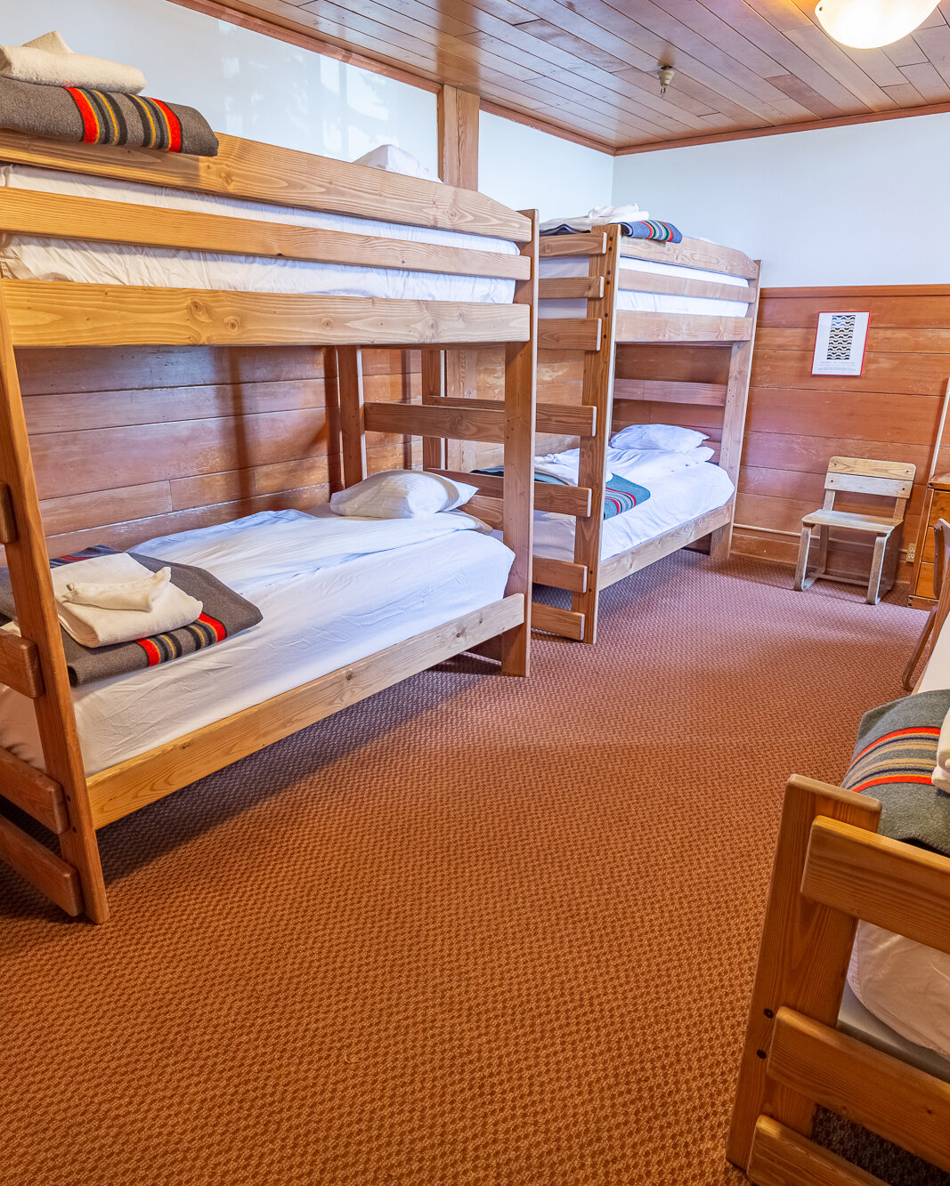 A medium chalet room at Timberline Lodge, featured three bunk beds